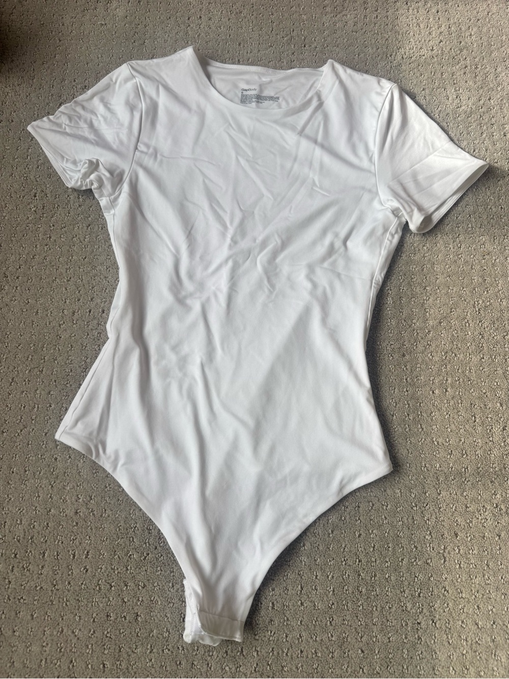 Gap white body suite size small.